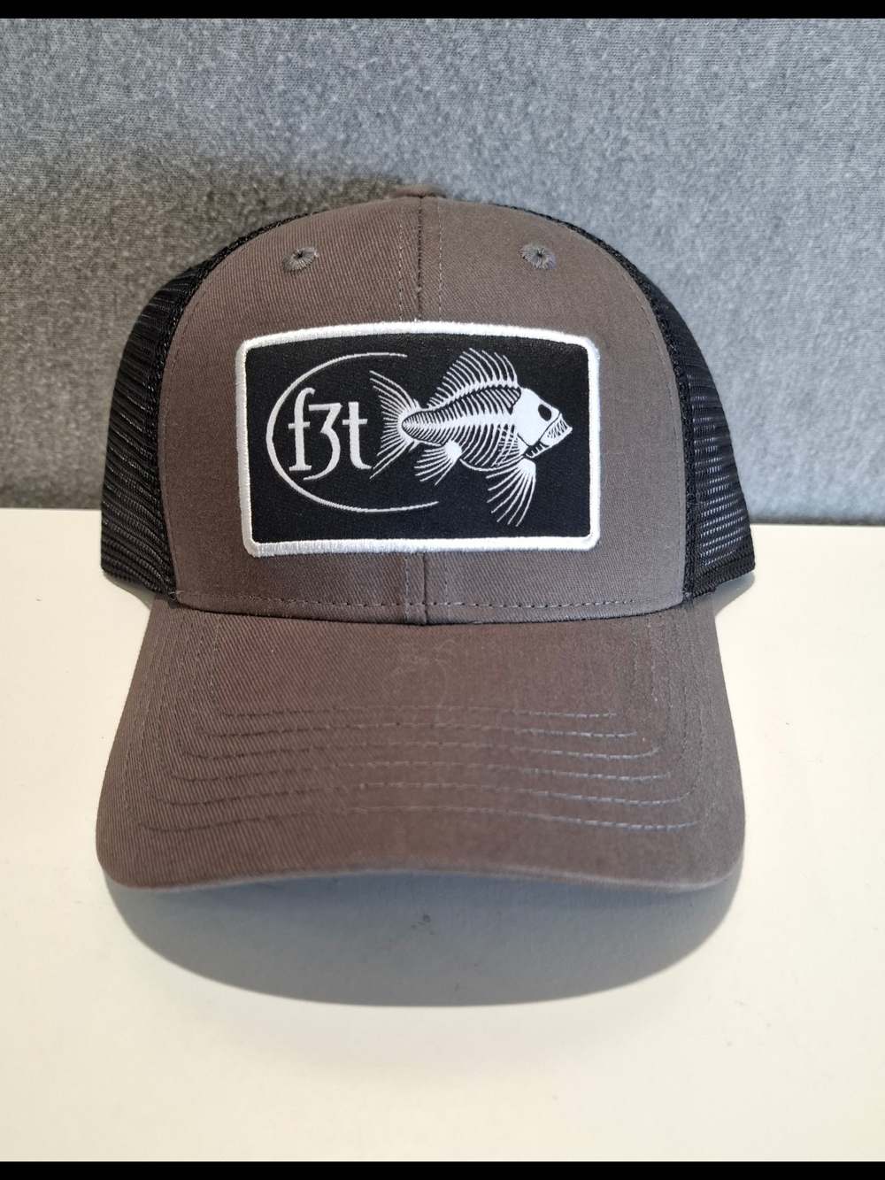 Costa Fish Patch Trucker Hat - Gray/Black